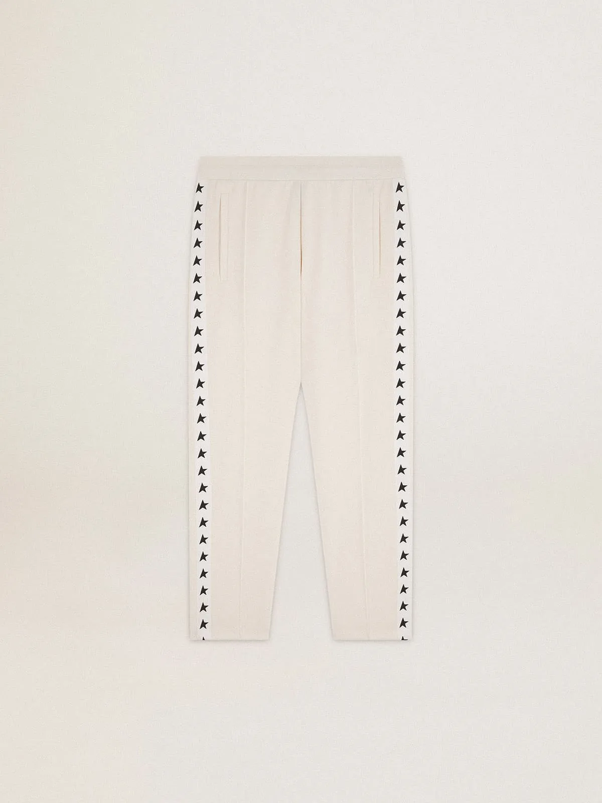 Men's white joggers with black stars on the sides